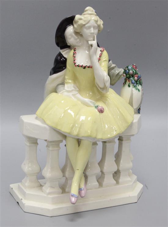 A Keramos Wiener Kunstkeramik pottery group of a courting couple, early 20th century, 36.5cm, damage to plinth base